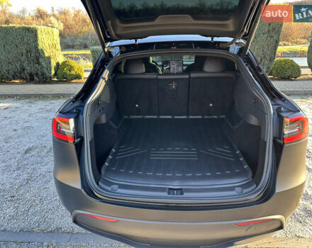 Черный Тесла Model Y, объемом двигателя 0 л и пробегом 60 тыс. км за 22999 $, фото 37 на Automoto.ua