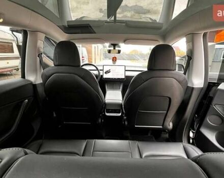 Чорний Тесла Model Y, об'ємом двигуна 0 л та пробігом 73 тис. км за 27999 $, фото 19 на Automoto.ua