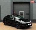 Черный Тесла Model Y, объемом двигателя 0 л и пробегом 99 тыс. км за 23999 $, фото 1 на Automoto.ua