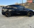 Черный Тесла Model Y, объемом двигателя 0 л и пробегом 59 тыс. км за 24900 $, фото 26 на Automoto.ua