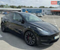 Черный Тесла Model Y, объемом двигателя 0 л и пробегом 61 тыс. км за 25000 $, фото 1 на Automoto.ua