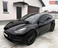 Чорний Тесла Model Y, об'ємом двигуна 0 л та пробігом 73 тис. км за 27999 $, фото 2 на Automoto.ua