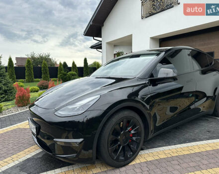 Черный Тесла Model Y, объемом двигателя 0 л и пробегом 74 тыс. км за 27999 $, фото 2 на Automoto.ua