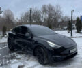 Черный Тесла Model Y, объемом двигателя 0 л и пробегом 56 тыс. км за 26999 $, фото 2 на Automoto.ua