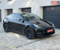 Черный Тесла Model Y, объемом двигателя 0 л и пробегом 48 тыс. км за 28999 $, фото 1 на Automoto.ua