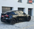 Черный Тесла Model Y, объемом двигателя 0 л и пробегом 48 тыс. км за 28999 $, фото 4 на Automoto.ua
