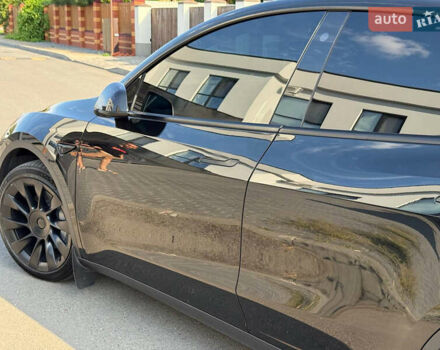 Черный Тесла Model Y, объемом двигателя 0 л и пробегом 79 тыс. км за 31999 $, фото 73 на Automoto.ua