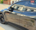 Черный Тесла Model Y, объемом двигателя 0 л и пробегом 79 тыс. км за 31999 $, фото 73 на Automoto.ua
