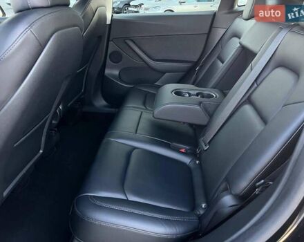 Черный Тесла Model Y, объемом двигателя 0 л и пробегом 73 тыс. км за 27890 $, фото 25 на Automoto.ua