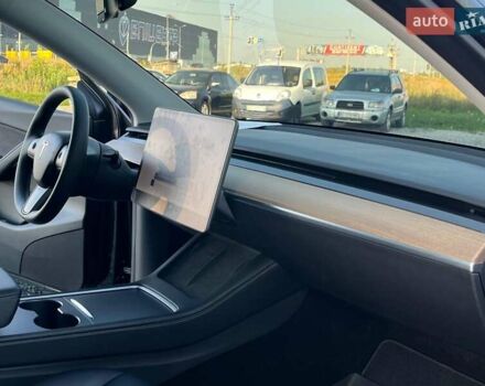 Черный Тесла Model Y, объемом двигателя 0 л и пробегом 73 тыс. км за 27890 $, фото 37 на Automoto.ua