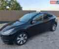 Черный Тесла Model Y, объемом двигателя 0 л и пробегом 70 тыс. км за 23999 $, фото 1 на Automoto.ua