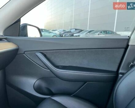 Черный Тесла Model Y, объемом двигателя 0 л и пробегом 73 тыс. км за 27890 $, фото 23 на Automoto.ua