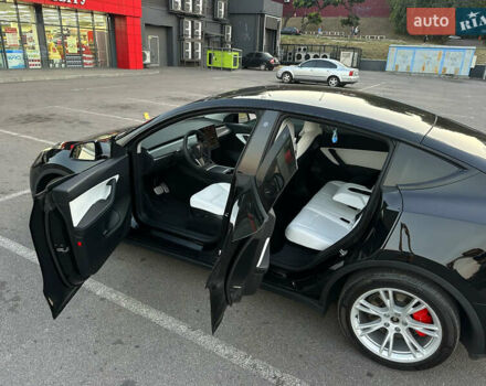 Чорний Тесла Model Y, об'ємом двигуна 0 л та пробігом 135 тис. км за 26499 $, фото 25 на Automoto.ua