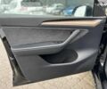 Черный Тесла Model Y, объемом двигателя 0 л и пробегом 25 тыс. км за 26990 $, фото 14 на Automoto.ua
