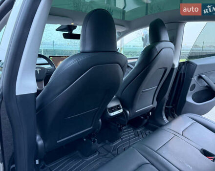 Черный Тесла Model Y, объемом двигателя 0 л и пробегом 53 тыс. км за 34999 $, фото 22 на Automoto.ua