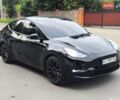 Черный Тесла Model Y, объемом двигателя 0 л и пробегом 66 тыс. км за 23990 $, фото 1 на Automoto.ua