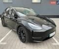 Черный Тесла Model Y, объемом двигателя 0 л и пробегом 84 тыс. км за 27500 $, фото 1 на Automoto.ua