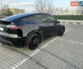 Черный Тесла Model Y, объемом двигателя 0 л и пробегом 75 тыс. км за 33500 $, фото 1 на Automoto.ua