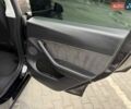 Черный Тесла Model Y, объемом двигателя 0 л и пробегом 54 тыс. км за 25500 $, фото 25 на Automoto.ua