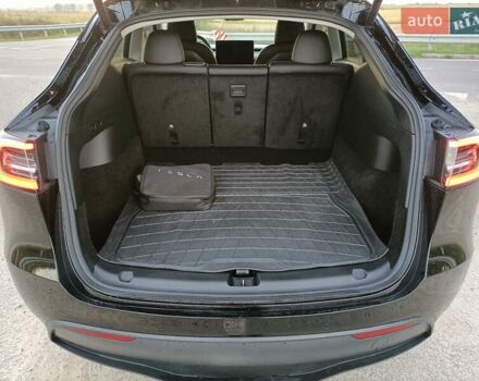 Черный Тесла Model Y, объемом двигателя 0 л и пробегом 52 тыс. км за 26300 $, фото 16 на Automoto.ua