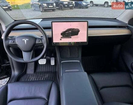 Черный Тесла Model Y, объемом двигателя 0 л и пробегом 73 тыс. км за 27890 $, фото 26 на Automoto.ua