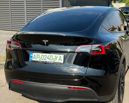 Черный Тесла Model Y, объемом двигателя 0 л и пробегом 79 тыс. км за 31999 $, фото 62 на Automoto.ua