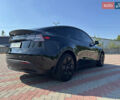 Черный Тесла Model Y, объемом двигателя 0 л и пробегом 61 тыс. км за 25900 $, фото 1 на Automoto.ua