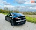 Черный Тесла Model Y, объемом двигателя 0 л и пробегом 10 тыс. км за 28999 $, фото 2 на Automoto.ua