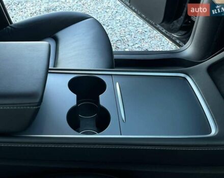 Черный Тесла Model Y, объемом двигателя 0 л и пробегом 73 тыс. км за 27890 $, фото 40 на Automoto.ua