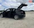 Черный Тесла Model Y, объемом двигателя 0 л и пробегом 83 тыс. км за 25500 $, фото 19 на Automoto.ua