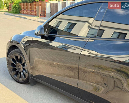 Черный Тесла Model Y, объемом двигателя 0 л и пробегом 79 тыс. км за 31999 $, фото 66 на Automoto.ua