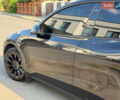 Черный Тесла Model Y, объемом двигателя 0 л и пробегом 79 тыс. км за 31999 $, фото 66 на Automoto.ua