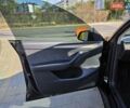 Черный Тесла Model Y, объемом двигателя 0 л и пробегом 27 тыс. км за 28999 $, фото 11 на Automoto.ua