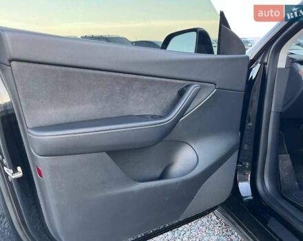 Черный Тесла Model Y, объемом двигателя 0 л и пробегом 73 тыс. км за 27890 $, фото 16 на Automoto.ua