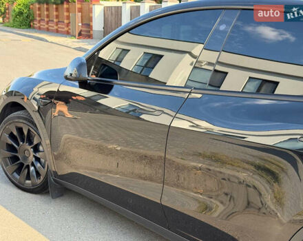 Черный Тесла Model Y, объемом двигателя 0 л и пробегом 79 тыс. км за 31999 $, фото 58 на Automoto.ua