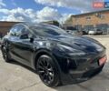 Черный Тесла Model Y, объемом двигателя 0 л и пробегом 49 тыс. км за 27555 $, фото 1 на Automoto.ua