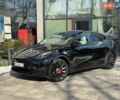 Черный Тесла Model Y, объемом двигателя 0 л и пробегом 80 тыс. км за 35000 $, фото 1 на Automoto.ua