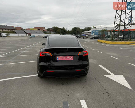 Черный Тесла Model Y, объемом двигателя 0 л и пробегом 65 тыс. км за 27000 $, фото 4 на Automoto.ua
