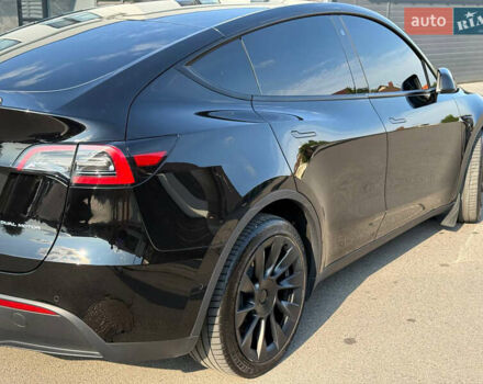 Черный Тесла Model Y, объемом двигателя 0 л и пробегом 79 тыс. км за 31999 $, фото 56 на Automoto.ua