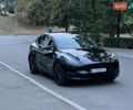 Черный Тесла Model Y, объемом двигателя 0 л и пробегом 77 тыс. км за 28900 $, фото 31 на Automoto.ua