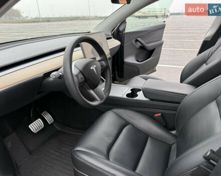 Черный Тесла Model Y, объемом двигателя 0 л и пробегом 22 тыс. км за 27999 $, фото 20 на Automoto.ua