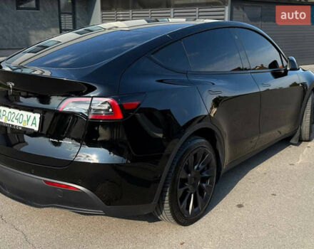 Черный Тесла Model Y, объемом двигателя 0 л и пробегом 79 тыс. км за 31999 $, фото 57 на Automoto.ua