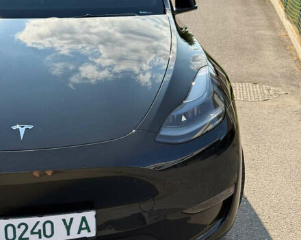 Черный Тесла Model Y, объемом двигателя 0 л и пробегом 79 тыс. км за 31999 $, фото 75 на Automoto.ua