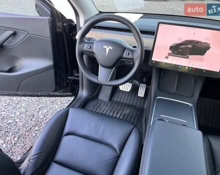 Черный Тесла Model Y, объемом двигателя 0 л и пробегом 73 тыс. км за 27890 $, фото 31 на Automoto.ua