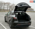 Черный Тесла Model Y, объемом двигателя 0 л и пробегом 22 тыс. км за 27999 $, фото 16 на Automoto.ua