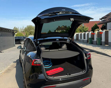 Черный Тесла Model Y, объемом двигателя 0 л и пробегом 79 тыс. км за 31999 $, фото 47 на Automoto.ua