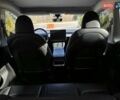 Черный Тесла Model Y, объемом двигателя 0 л и пробегом 27 тыс. км за 28999 $, фото 13 на Automoto.ua