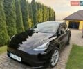 Черный Тесла Model Y, объемом двигателя 0 л и пробегом 100 тыс. км за 22900 $, фото 1 на Automoto.ua