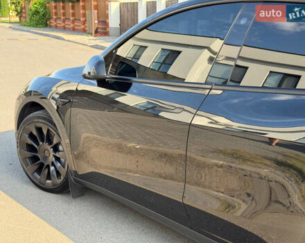 Черный Тесла Model Y, объемом двигателя 0 л и пробегом 79 тыс. км за 31999 $, фото 67 на Automoto.ua