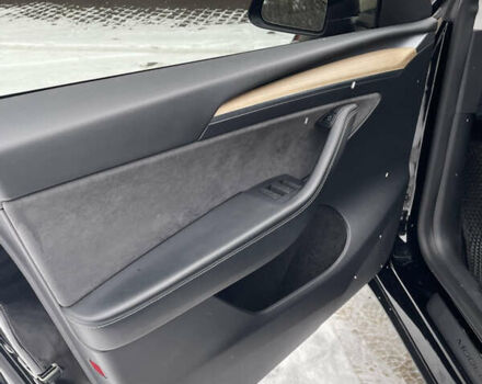 Черный Тесла Model Y, объемом двигателя 0 л и пробегом 56 тыс. км за 26999 $, фото 19 на Automoto.ua